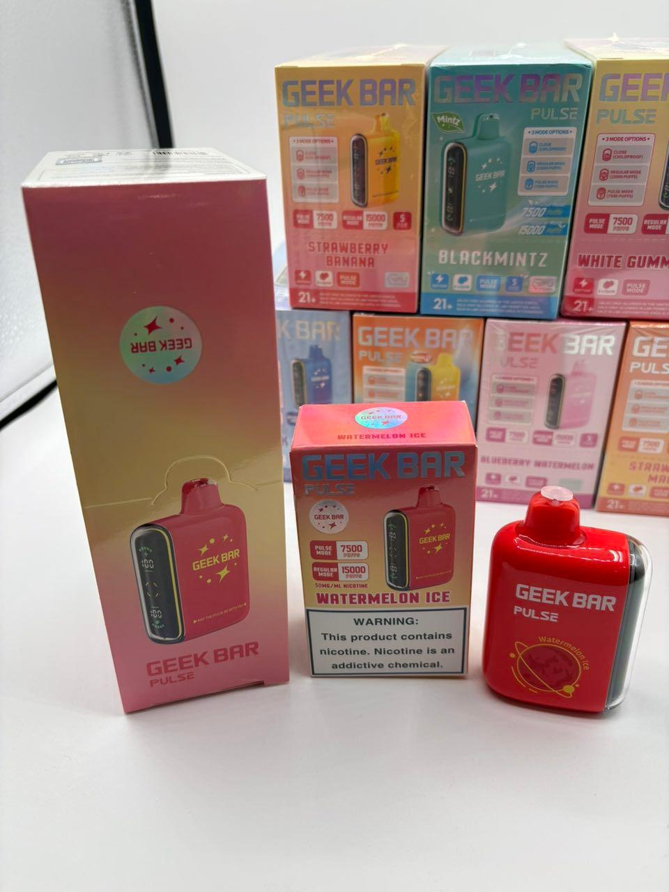 A collection of Geek Bar Pulse 15000 puff disposable vapes in various flavors including Strawberry Banana, Watermelon Ice, and Blackmintz A collection of Geek Bar Pulse 15000 puff disposable vapes in various flavors including Strawberry Banana, Watermelon Ice, and Blackmintz