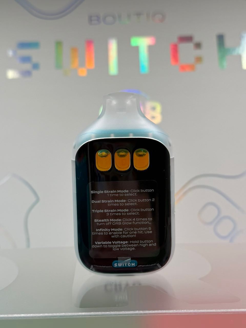 Boutiq Switch V5 2.0g hardware showing the Triple Tank isolation system and digital ORB Glow interface Boutiq Switch V5 2.0g hardware showing the Triple Tank isolation system and digital ORB Glow interface