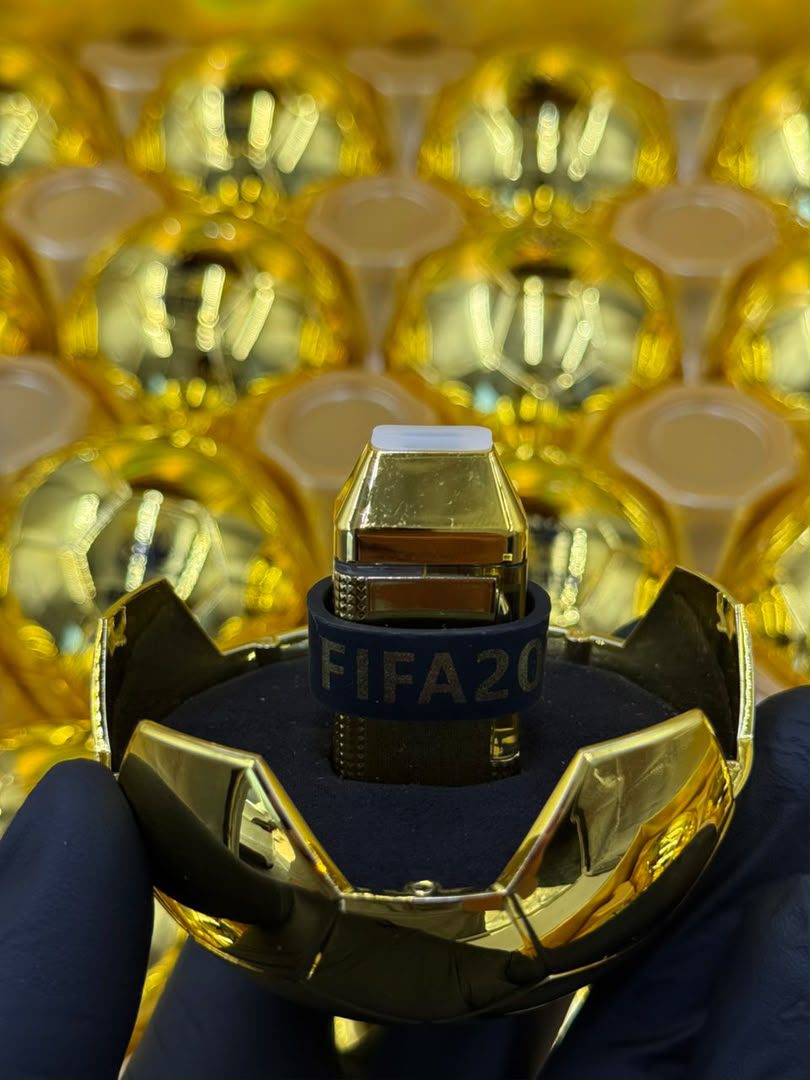Premium World Cup Edition 5 Pack luxury gold collector's box featuring premium football-shaped units arranged in an elegant display case with metallic gold finish and championship-inspired packaging.