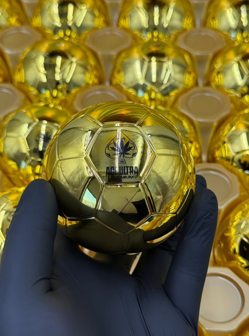 Ace Ultra Premium World Cup Edition holographic gold luxury 5-unit display box featuring geometric patterns, football motifs, and an etched brand logo